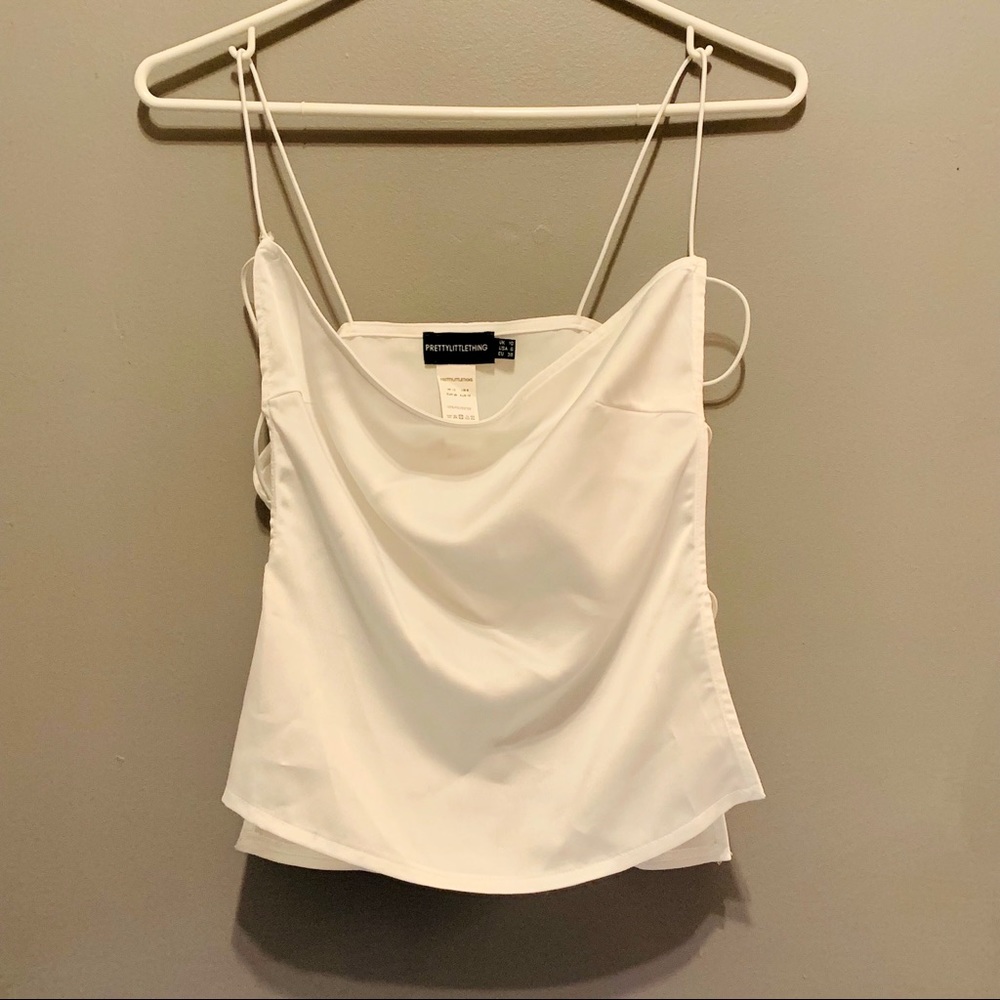 Pretty little thing white top in size 6 or small
